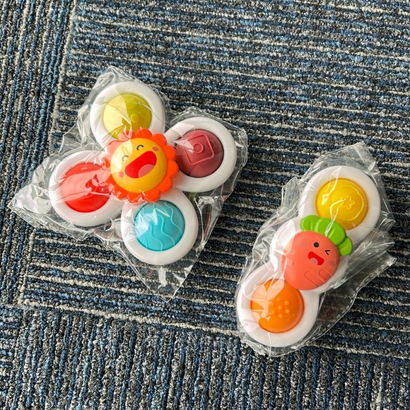 AMAZON suction spinner rattle and pop toy NWT - Picture 1 of 2
